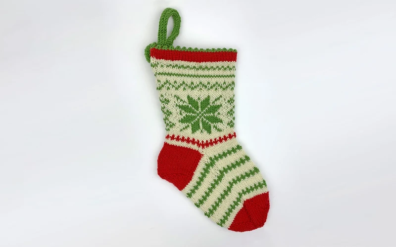 Strickanleitung JULSTRUMPA (PDF)