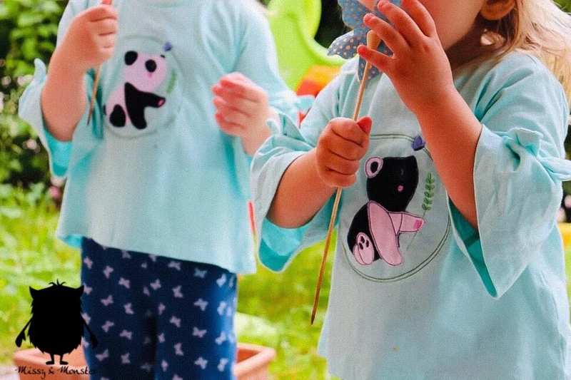 Stickdatei PANDA Pit mit Schmetterling