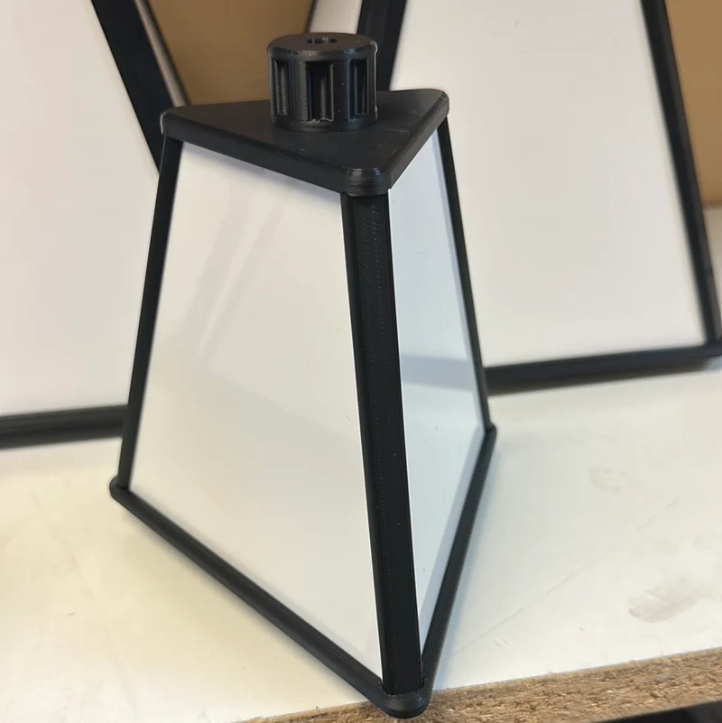 . Space saving Small spinning accessory pyramid 7” tall 6” wide Mini