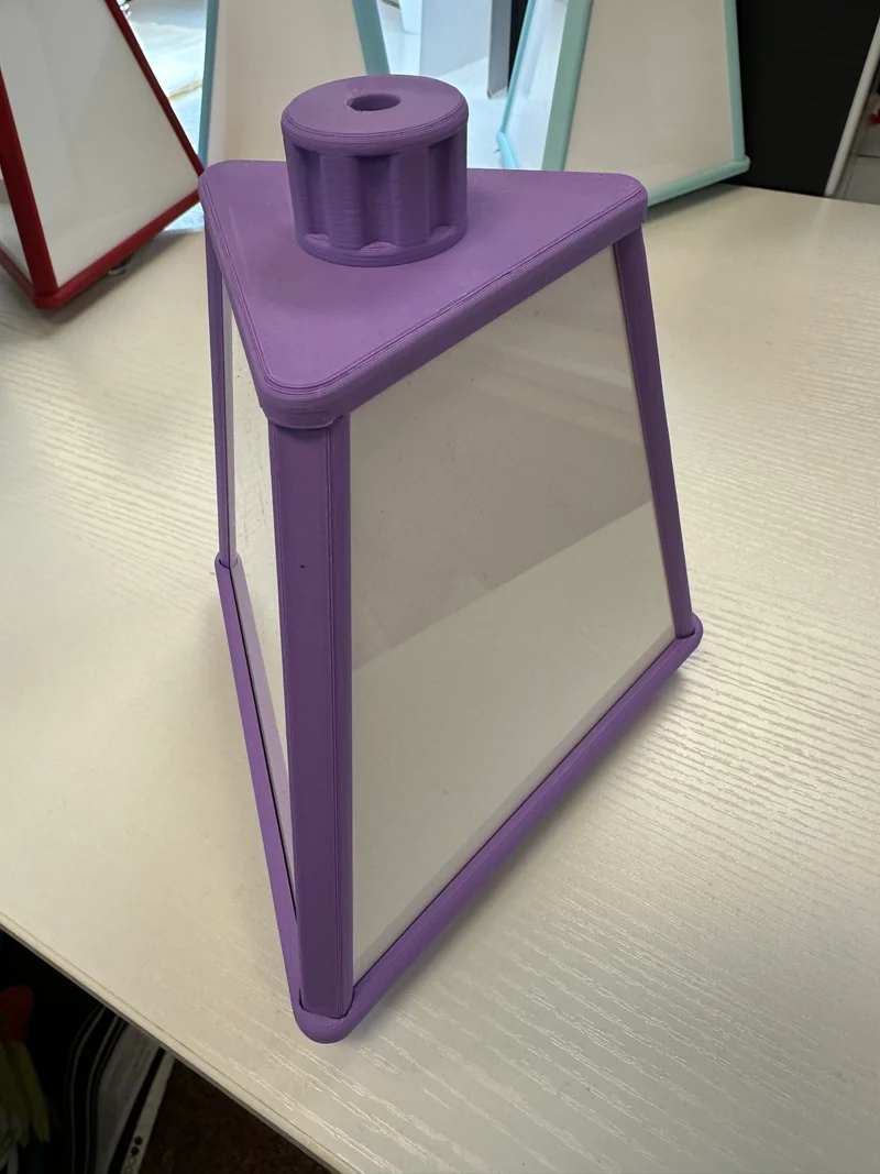 . Space saving Small spinning accessory pyramid 7” tall 6” wide Mini