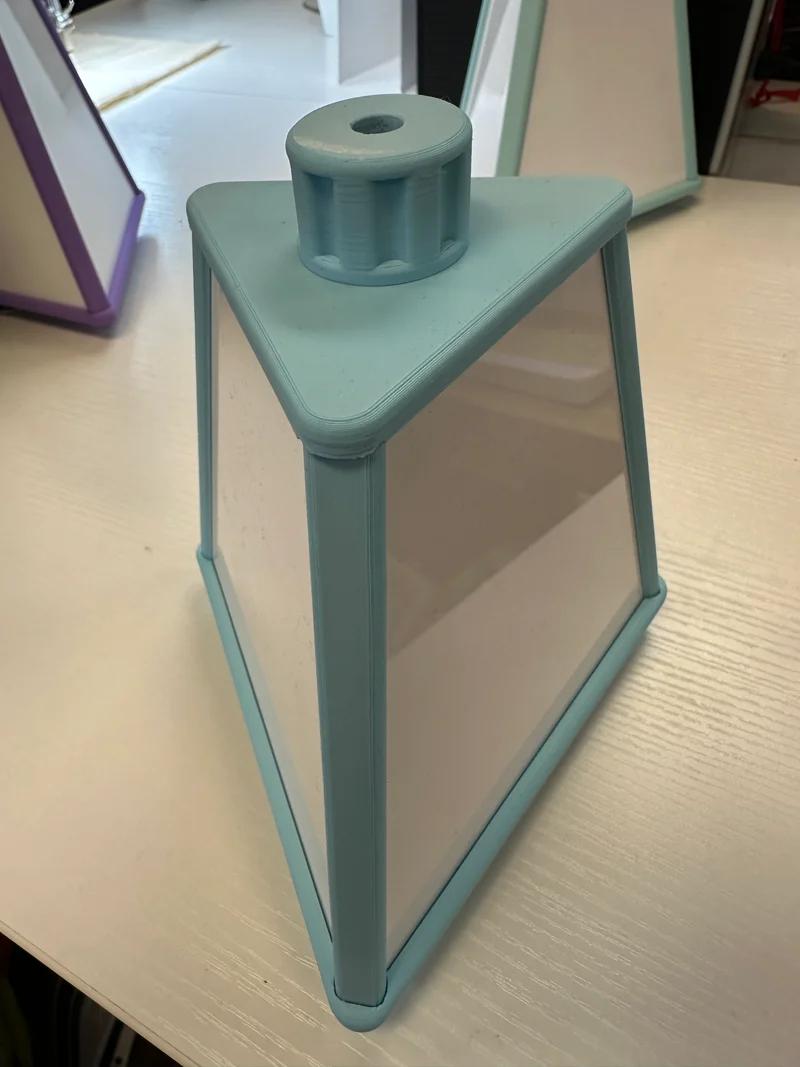. Space saving Small spinning accessory pyramid 7” tall 6” wide Mini