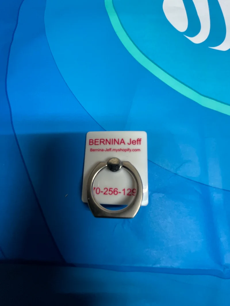Caddy / holder for scissors or reading glasses Bernina Jeff Logo. Very strong stick-on backing. B116