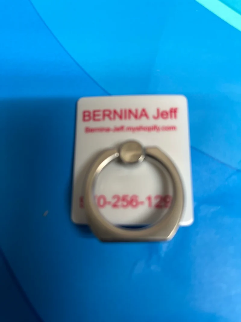 Caddy / holder for scissors or reading glasses Bernina Jeff Logo. Very strong stick-on backing. B116