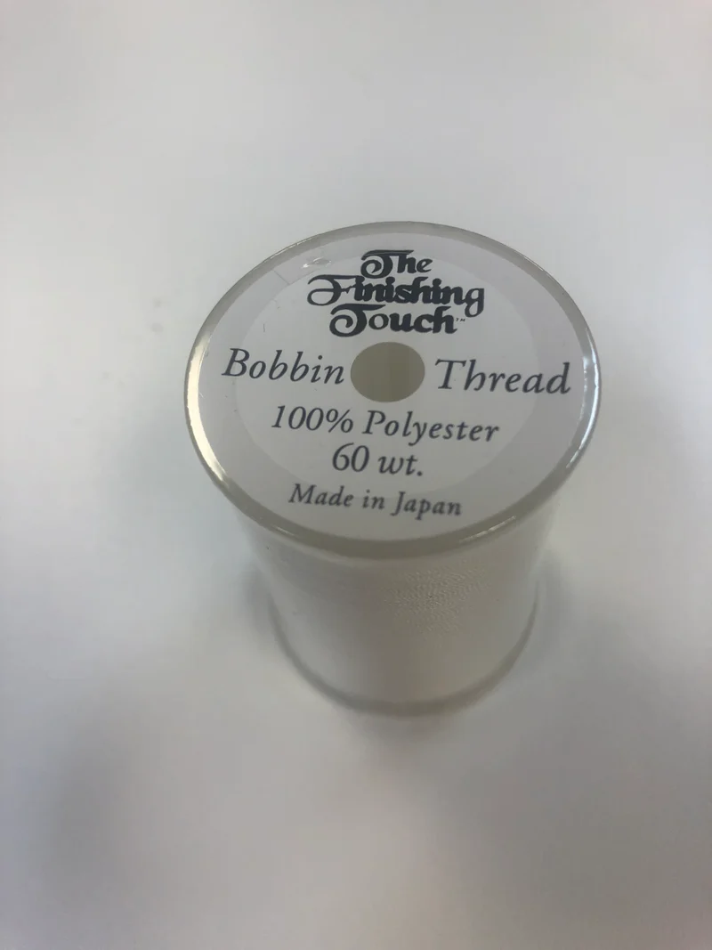 The Finishing Touch Bobbin thread 60 Wt. 1200 yards white Recommended by Jeff for embroidery bobbins Bernina 7 series & Baby Locks