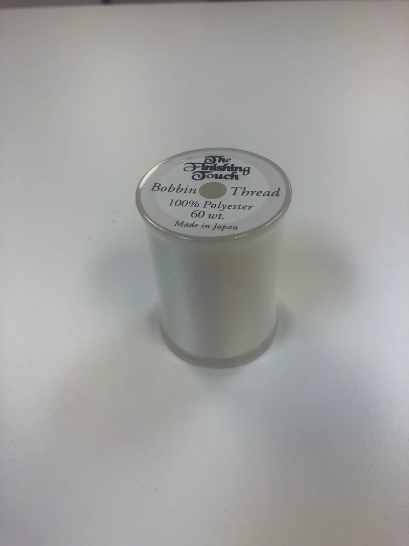 The Finishing Touch Bobbin thread 60 Wt. 1200 yards white Recommended by Jeff for embroidery bobbins Bernina 7 series & Baby Locks