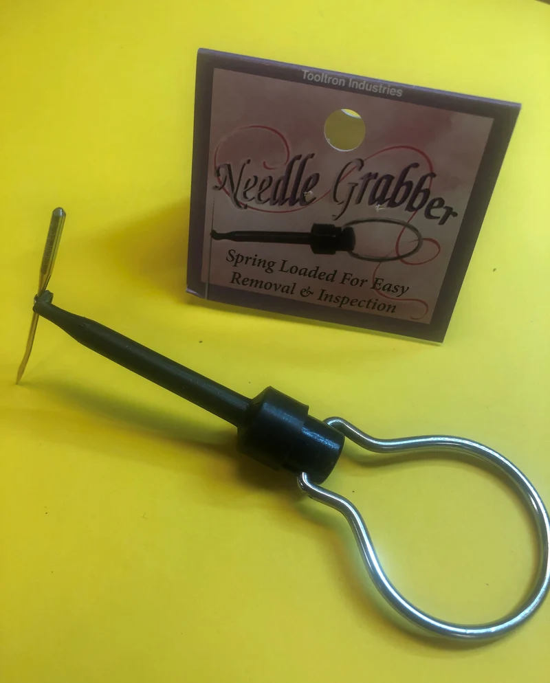 Needle Grabber with handle. Spring loaded hook to hold sewing machine needle to insert in machine B90