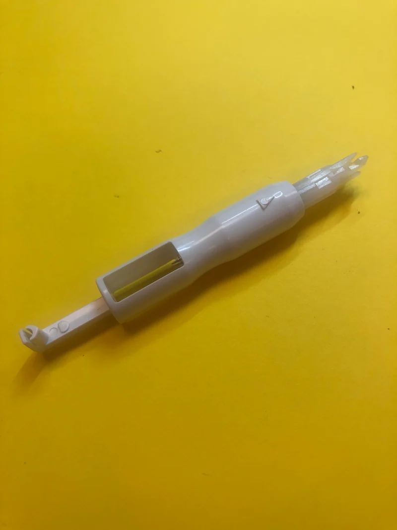 Sewing Machine Needle Threader really works well also holds a needle works on any brand great on Featherweights B137