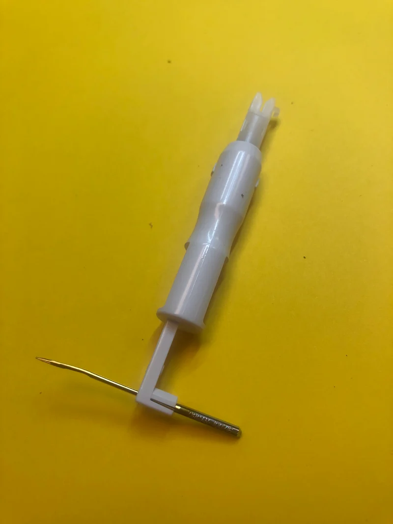 Sewing Machine Needle Threader really works well also holds a needle works on any brand great on Featherweights B137