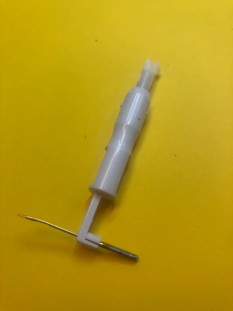 Sewing Machine Needle Threader really works well also holds a needle works on any brand great on Featherweights B137