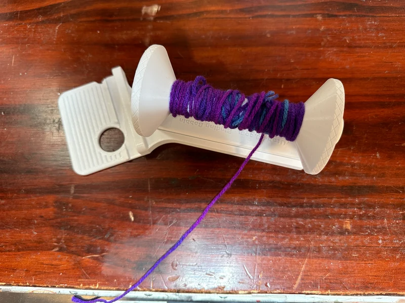 .Binding Bobbin holds and rolls binding couching cords OS