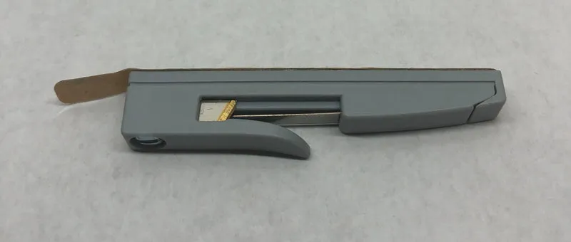 Thread holder/cutter for needle threader peal and stick application B136