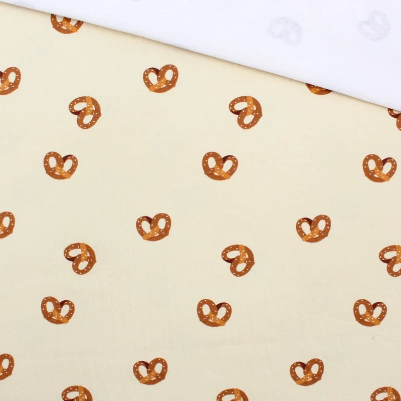 Jersey Stoff Brezel Beige