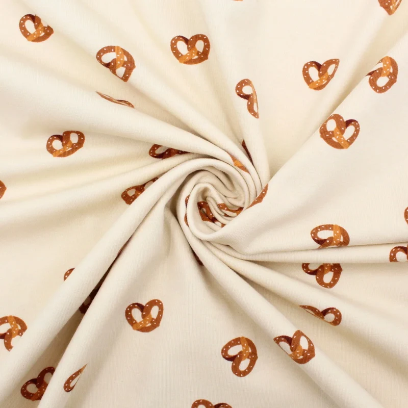 Jersey Stoff Brezel Beige