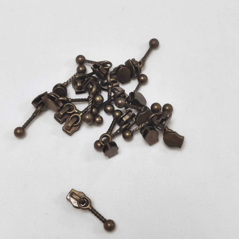 Schieber mit Kugelstab für Endlosreißverschluss 4,2 mm – Altmessing