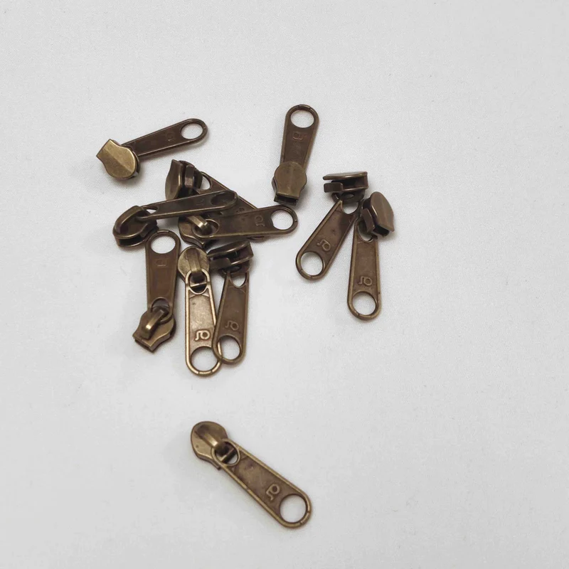 Standardschieber für Endlosreißverschluss 4,2 mm – Altmessing