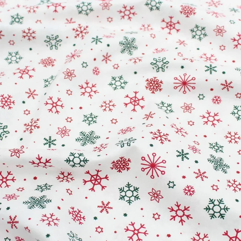 Popeline Stoff Weihnachtsstoff Schneeflocken und Sterne