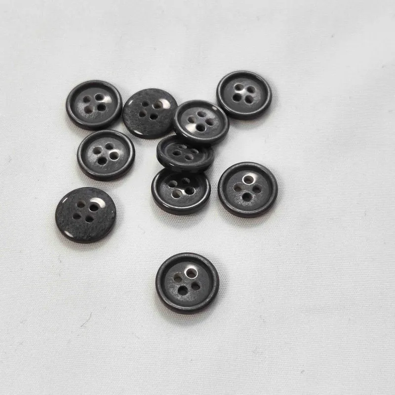 Polyesterknopf mit Rand 4-Loch, 13 mm
