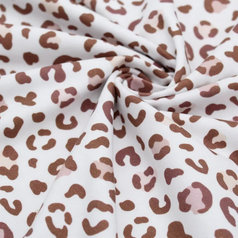 Jersey Stoff braune Leoparden Flecken | Weiß